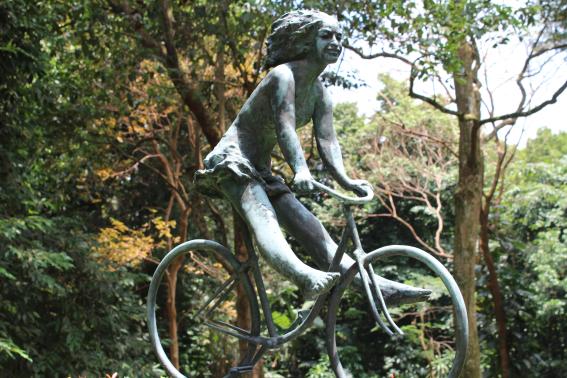 Girl on bike (bronze)